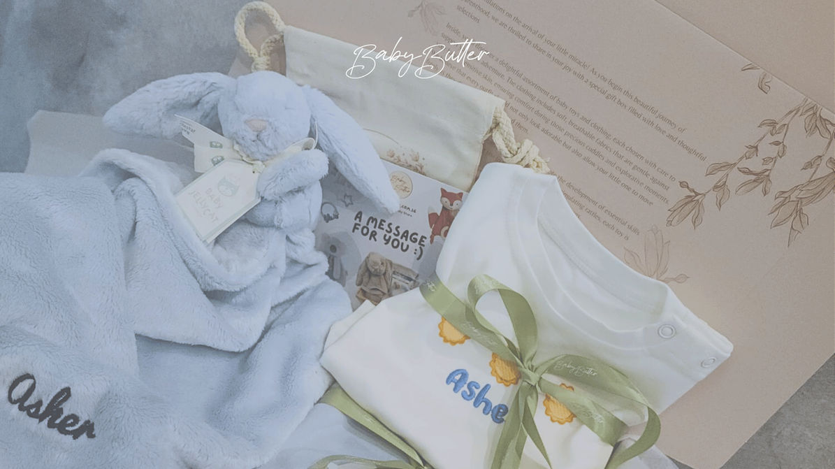Personalised baby gift box with romper and blanket